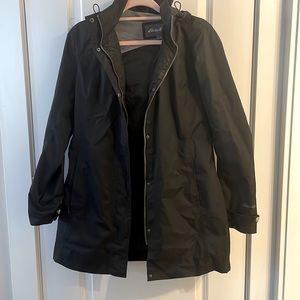 Eddie Bauer black rain jacket with hood. Smoke free home.